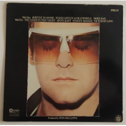 Elton John – Victim Of Love