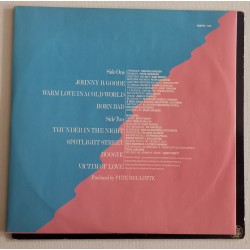 Elton John – Victim Of Love
