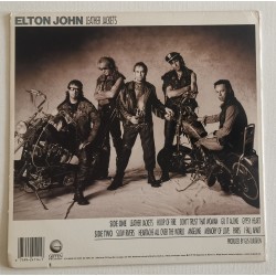 Elton John – Leather Jackets