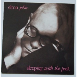 Elton John – Sleeping With...